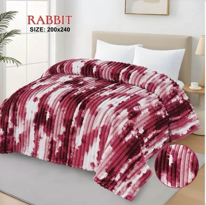 Luxurious maroon and white AC blanket for double bed, adding a pop of color to a modern bedroom.
