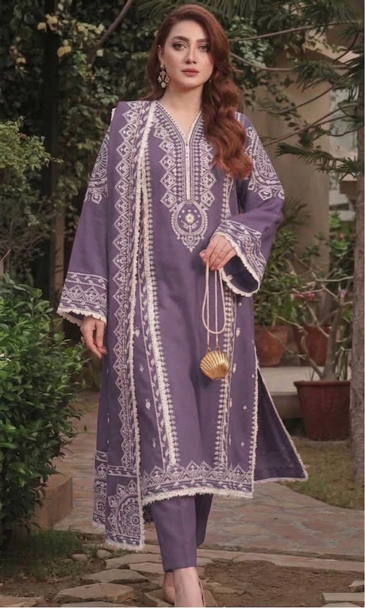 Model wearing a deep plum Aneelas winter collection 3-piece embroidered Dhanak suit with a digital printed Pashmina shawl.