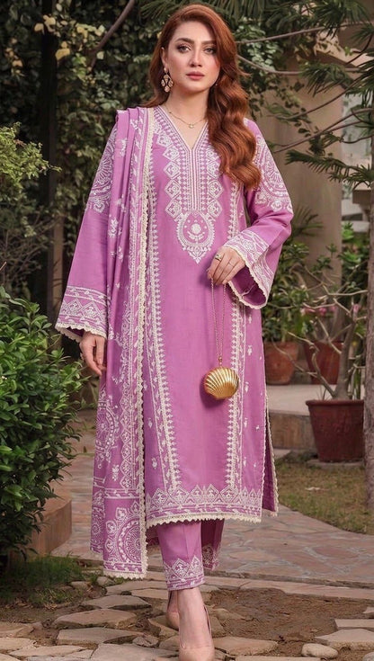 Woman modeling a purple Aneelas winter collection 3-piece embroidered Dhanak suit with a Pashmina shawl.