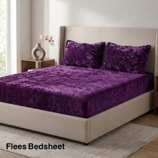 Purple fleece bedsheet king size in deep velvet fabric on bed