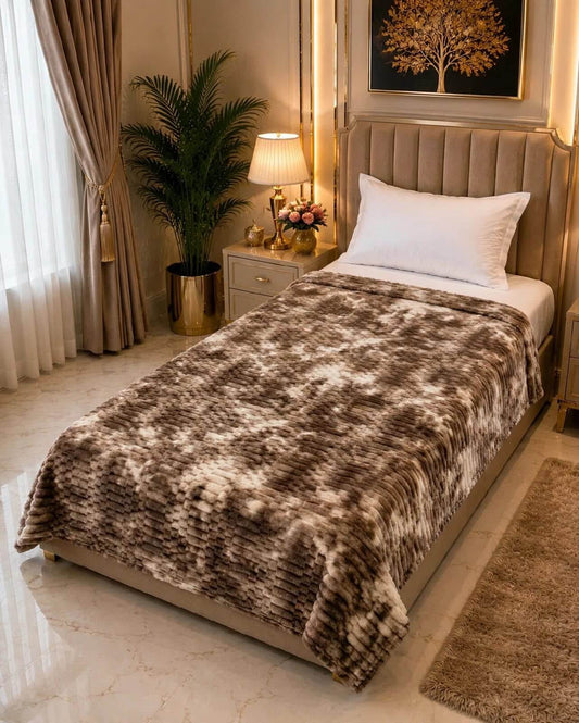 Brown luxury AC blanket for single bed draped beautifully in a modern bedroom setting.
