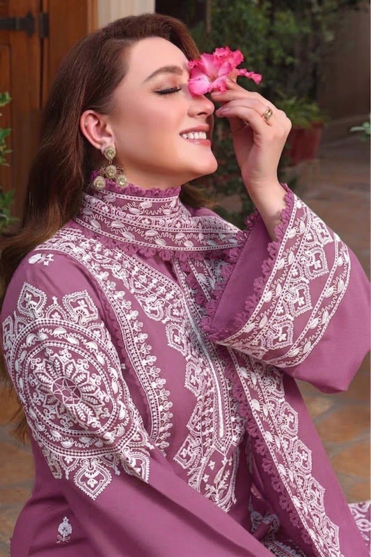 Close up of the heavy embroidery on the front neckline of the pure Dhanak winter dress.